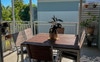 Large shared balcony area, facing NE.