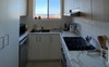 Kitchen with fully equipped kitchen utensils