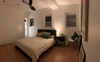Master bedroom with queen bed and big built-ins