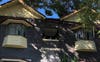 The charming tree filled apartment building