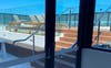 Entry to pool, BBQ & media area on roof