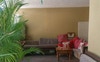 An outside sitting area to entertain on balcony 