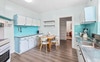 Shared Kitchen with dishwasher and dining area