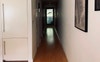 Hallway to rear balcony and bedroom