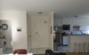 Laundry, entrance, and kitchen