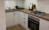 Shared kitchen with storage for all roommates.
