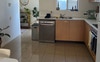 Open kitchen/dining area. 
