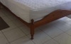 The bed in the room. 