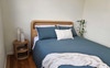 Furnished queen size bedroom. 
