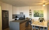 Fully equipped kitchen with gas cooktop and dishwa