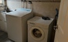 Laundry, washing machine and dryer
