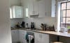 Kitchen with private cupboard space