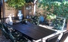 8 seater table in undercover patio