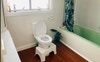 Bathroom with deep tub and shower.