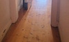 Three bedrooms are off the long hallway
