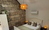 Alongside a private bathroom and living area.
