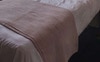 Bed sheets included.