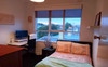 Airy double bed room with robe and drawers