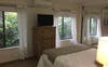 Bedroom with garden outlook and tv 