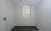 Second bedroom minus most furnishings +new air con