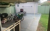Backyard with ice bath and bbq.