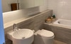 The main bathroom with bath and separate shower