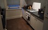Large kitchen with gas cooking