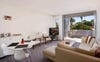 Gas heated living room leads to balcony
