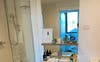 Your bathroom, with bath + laundry
