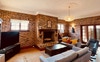 Brick lounge & dining with gas fireplace 