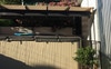 Swim spa with shed/studio to the right
