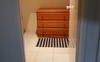 Walk in wardrobe with chest of drawers