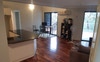 Living area with small dining table and chairs