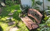 Park bench opposite the fish pond very relaxing 