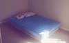 Queen bed with 2 pillows 