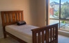 Bed and view out the window .