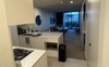 Furnished living room and kitchen 