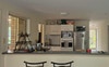 Kitchen separating main living space.