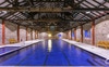 Indoor pool with spa and sauna