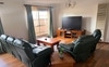 lounge room with 65 inch TV. 