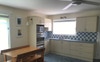 Fully equipped kitchen with modern appliances 