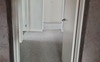 Hallway from living area to bedrooms/bathroom.