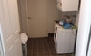Laundry with washing machine, dryer and cupboard